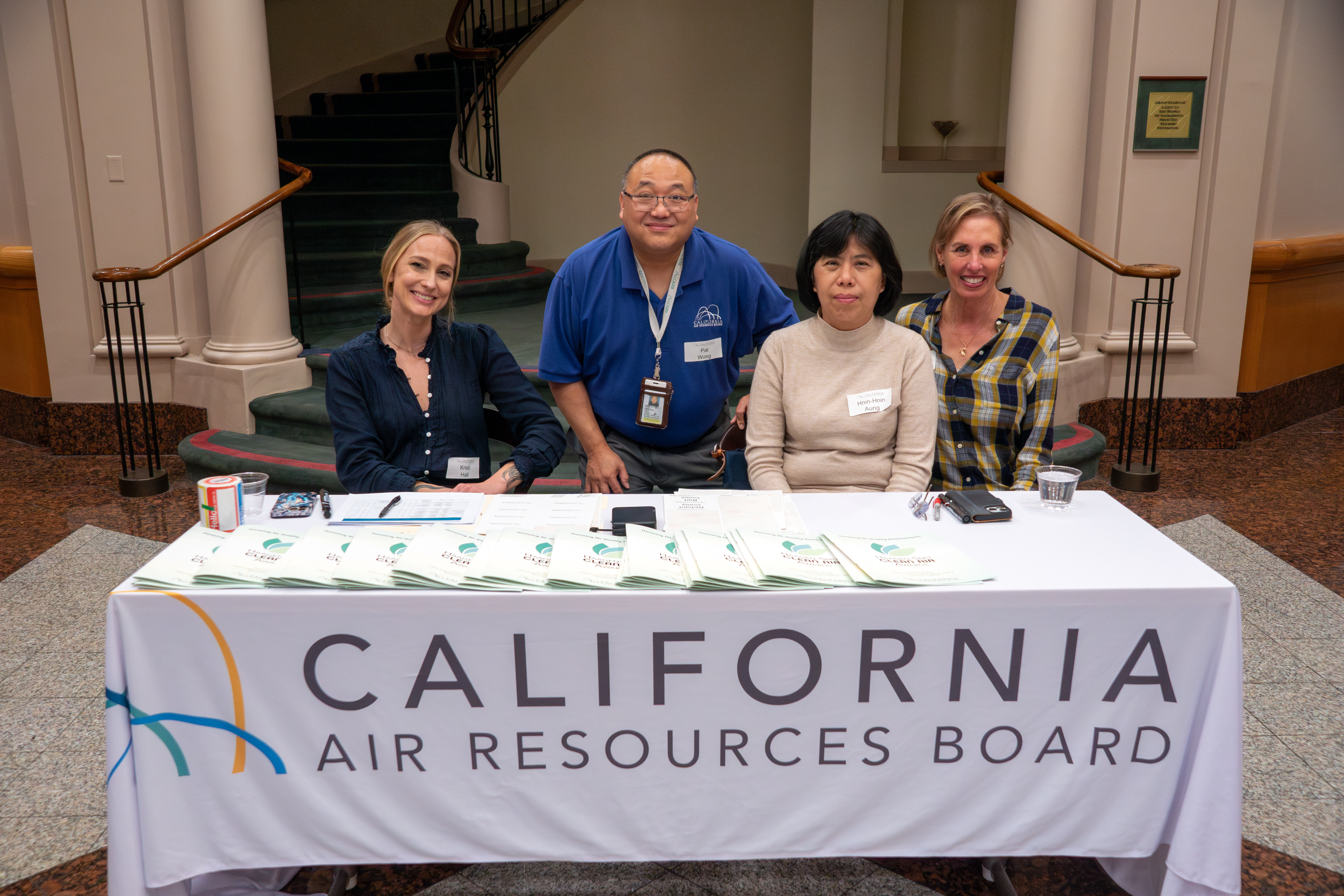 CARB Staff greeting attendees of the 2023 Haagen-Smit Clean Air Awards Reception.