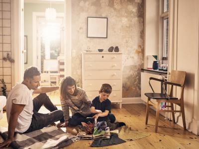 family sitting on floor