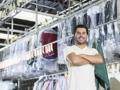 man in dry cleaning shop